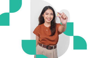 Woman with pill and water